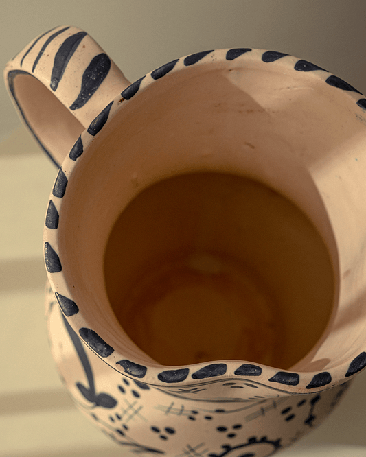 Hand-Painted Ceramic Pitcher with Bird Motif