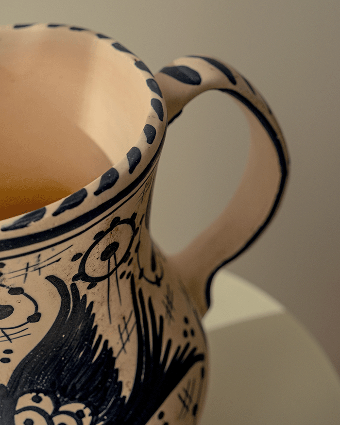 Hand-Painted Ceramic Pitcher with Bird Motif